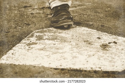 Vintage Photo Of Cleat Stepping On Plate At Home.