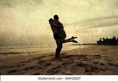 Vintage Photo Of Couple On The Beach