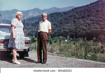 Vintage Photo Of Couple On Tar Road (early 1970's)