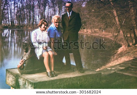 Vintage photo of couple with teenager daughter (early 1970's)