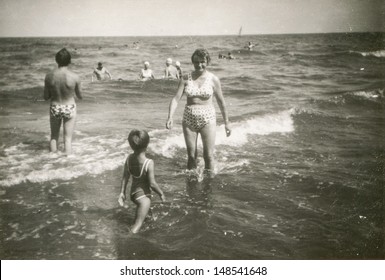 Vintage Photo Of Family Bathing In Sea, Sixties