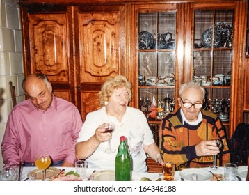 Vintage Photo Of Family Members Parting, Eighties