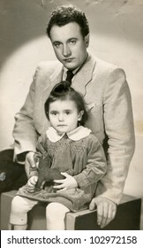 Vintage photo of father and daughter (fifties)