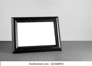 Vintage Photo Frame On Table In Black And White