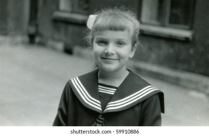 Vintage Photo Of Girl In School Uniform (circa 1961)