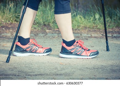 Vintage Photo, Legs Of Elderly Senior Woman In Sporty Shoes Practicing Nordic Walking, Healthy Sporty Lifestyles In Old Age