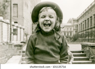 Vintage Photo Of Little Girl Laughing (fifties)