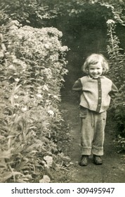 Vintage photo of little girl outdoor, 1950's