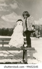 Vintage Photo Of Little Girl With A Snowman (fifties)