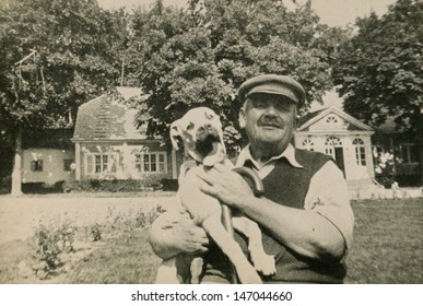 Vintage Photo Of Man With A Dog, Circa 1950