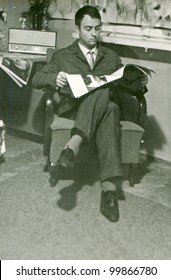 Vintage Photo Of Man Reading A Newspaper (seventies)