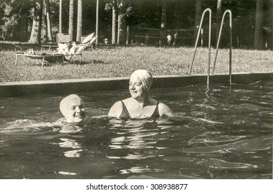 Vintage Photo Of Mother And Daughter Bathing In Swimming Pool, 1950's