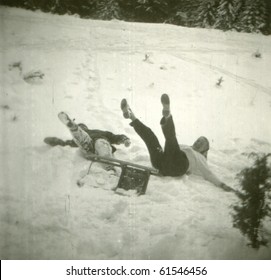 Vintage Photo Of Mother And Son During Sledding (fifties)