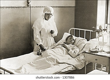 Vintage Photo Of A Nurse Checking Patients Vital Signs