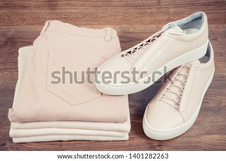 Similar – Image, Stock Photo pink textile shoes and other items for fitness
