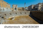 Vintage photo of Roman Amphiteathre in Lecce. Visible stone stairs or terrace on a sunny summer day.