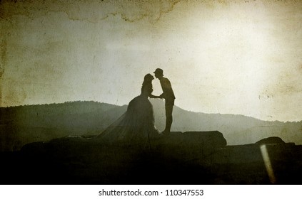 Vintage Photo Of Silhouette Image Of A Bride And Groom