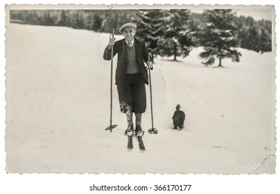 Vintage photo from skiing man in snow. Antique picture with original film grain and scratches