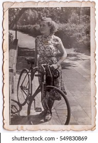 Vintage Photo Of Young Woman With A Bike (Poland, 1950's)