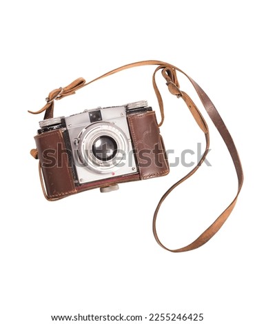 Vintage photographic machine with brown leather case and shoulder strap