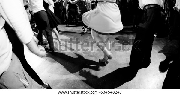 vintage photography in black and white of swing\
dance couples