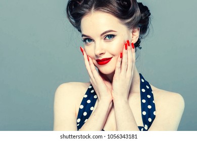 Vintage Pin Up Woman Portrait. Beautiful Retro Female In Polka Dot Dress With Red Lips  And Old Fshion Hairstyle