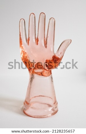vintage pink depression glass hand, ring model, holder isolated on white