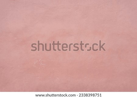 Vintage pink plaster wall texture background. Pastel color background. Abstract pink painted concrete wall surface background.