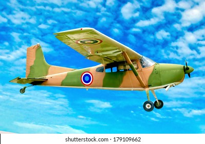 The Vintage Plane Of Worlld War On Blue Sky Background