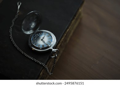 Vintage Pocket Watch on Antique Book - Timeless Elegance and Historic Charm - Powered by Shutterstock