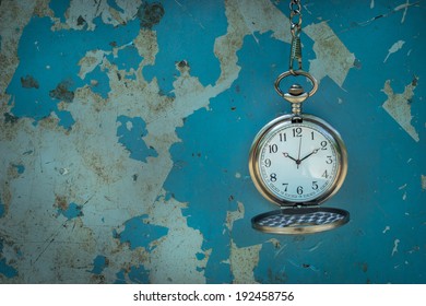 Vintage Pocket Watch On Rusty Metal Table