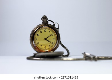 Vintage Pocket Watch On White Background With Copy Space