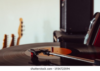 Vintage Portable Record Player Playing A Vynil Record With Copyspace.