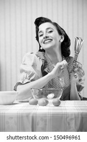 Vintage Portrait Of A Housewife In The Kitchen