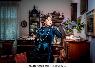 Vintage portrait of a stylish lady in an evening dress at the piano in the atmosphere of an old retro interior of the last century