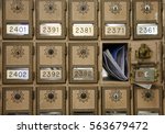 vintage post office boxes with mail