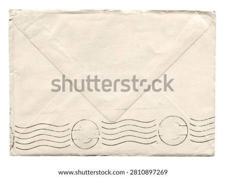 Vintage postal envelope with postmark wavy lines and blank stamp on worn paper texture isolated on white