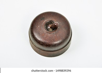 Vintage pull light switch isolated on white background