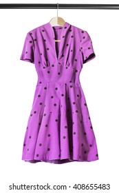 Vintage Purple Dress On Clothes Rack Isolated Over White