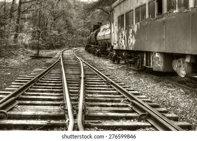 Vintage Railroad Tracks And Abandoned Train