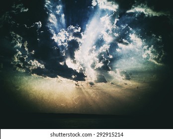 Vintage rays of sun cloudscape river horizon