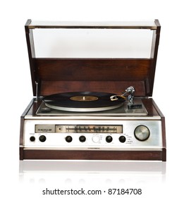 Vintage record player with radio tuner isolated on white background - Shutterstock ID 87184708