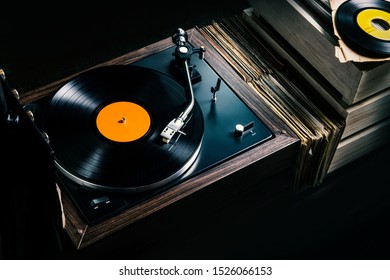 vintage record player, While playing the record, Black platter.