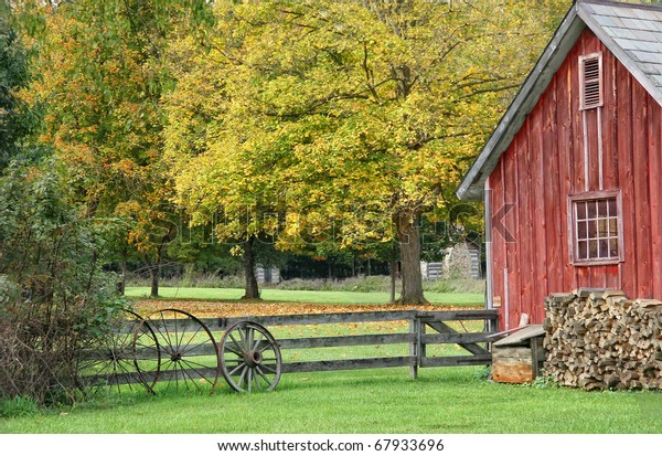 Vintage Red Barn Wagon Wheel Stock Photo (Edit Now) 67933696