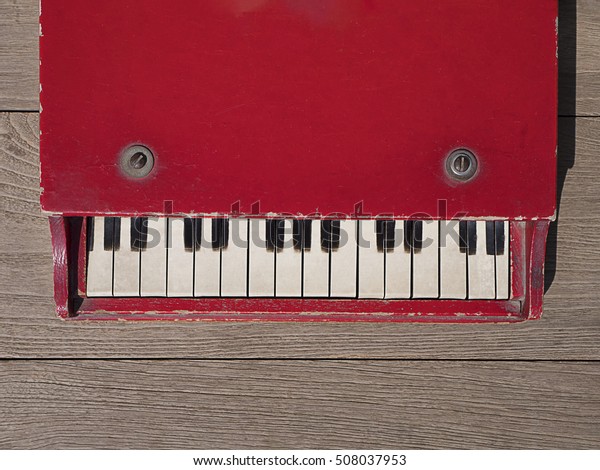 vintage wooden toy piano