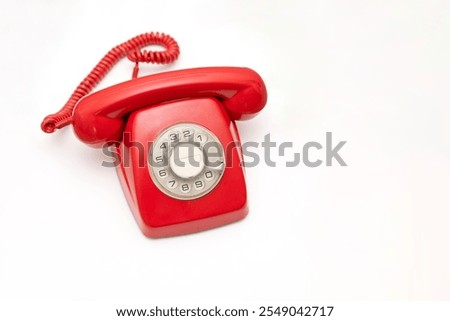 Similar – An old red telephone over red background