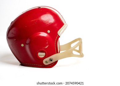 Vintage Red Stripe Youth Football Helmet On White Background With Room For Copy