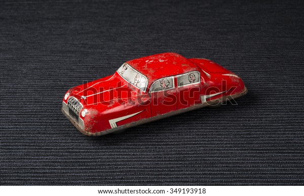 Vintage red tiny toy\
car