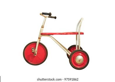 Vintage red tricycle isolated on white