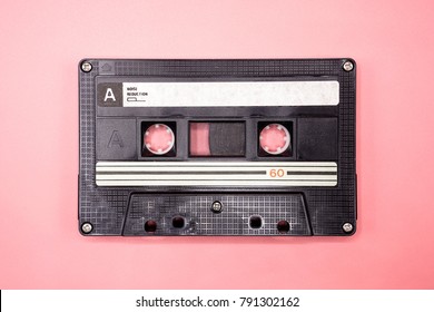 Vintage Retro Black Cassette Mix Tape on Pink Valentine Background